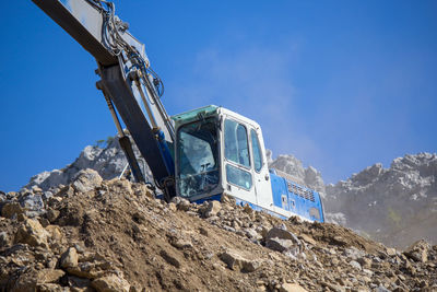 Low angle view of construction site against sky