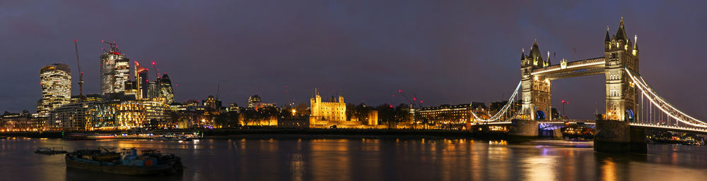 Illuminated buildings in city at night