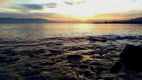 Scenic view of sea at sunset