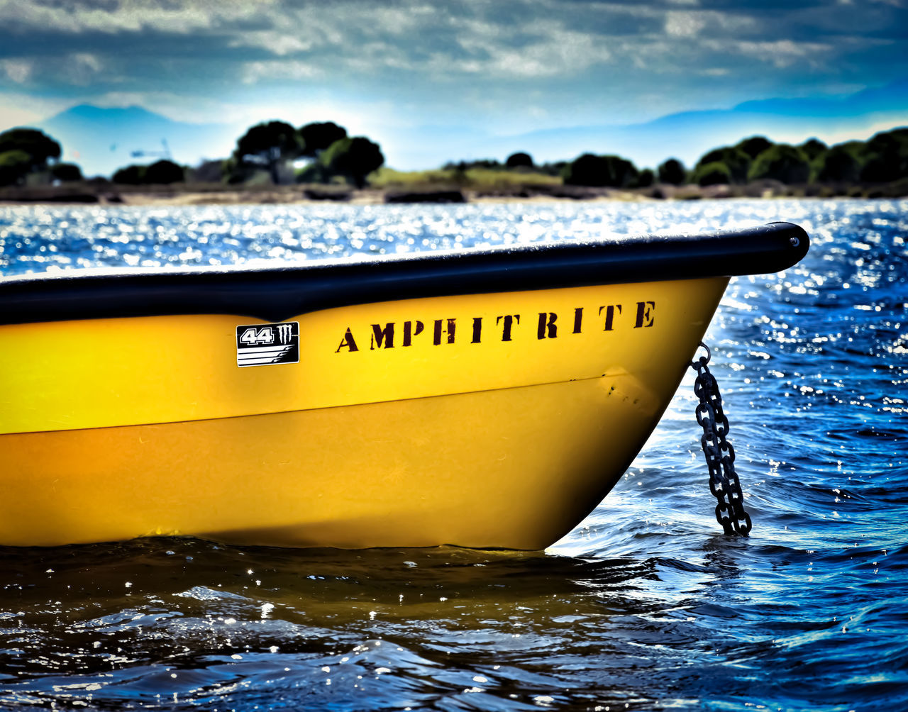 CLOSE-UP OF YELLOW SHIP IN SEA