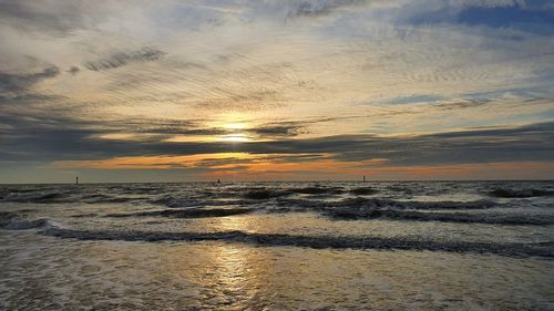 Scenic view of sea against sky during sunset