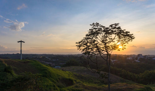 Scenic view of landscape against sky during sunset