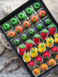 High angle view of multi colored candies on table