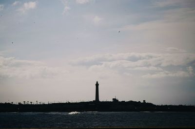 View of sea against cloudy sky