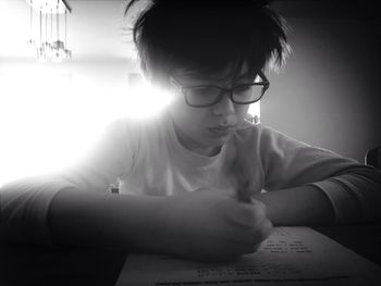 Boy wearing hat at home