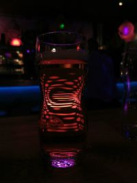 Close-up of beer glass on table