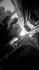 High angle view of worker working on bed