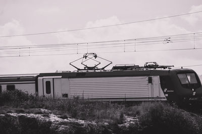 Low angle view of train against sky