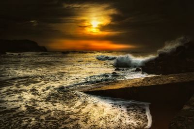 Scenic view of sea against sky during sunset