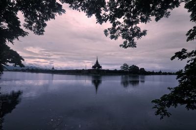 Reflection of trees in calm lake