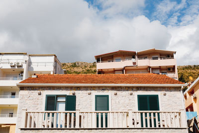 Low angle view of residential building against sky