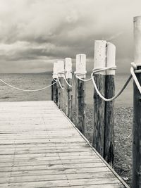 Pier over sea against sky