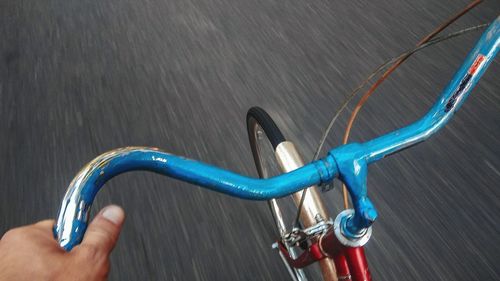 High angle view of person riding bicycle