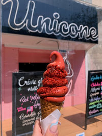 Midsection of woman with ice cream