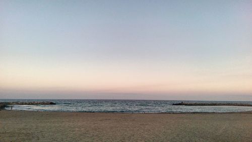 Scenic view of sea against clear sky