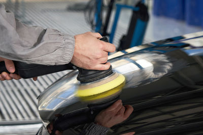 Midsection of man working in bus