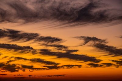 Low angle view of dramatic sky during sunset