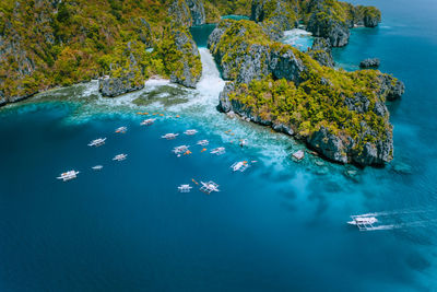 High angle view of rocks in sea