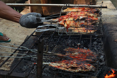 High angle view of meat on barbecue grill