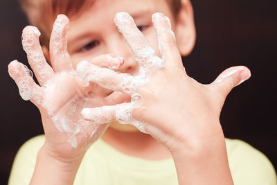 Close-up of hand holding hands