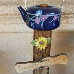 Close-up of flower pot against wall