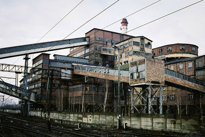 Low angle view of old building against sky