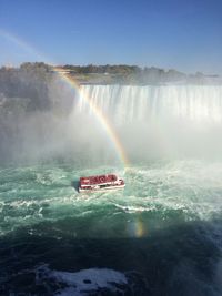 Scenic view of boat in sea against clear sky