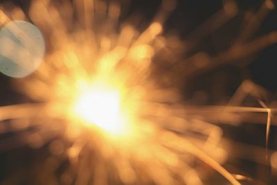 Defocused image of firework display at night