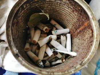 High angle view of cigarette in container