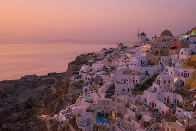 High angle view of cityscape against sea