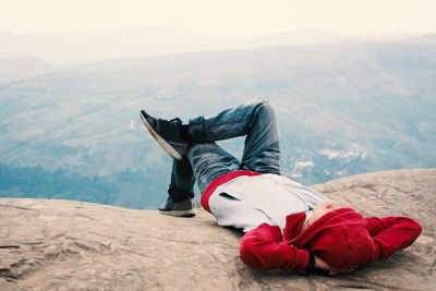 Man lying on mountains