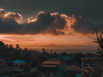 High angle view of townscape against sky at sunset