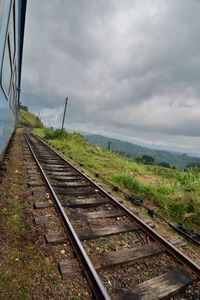 Railroad track against sky