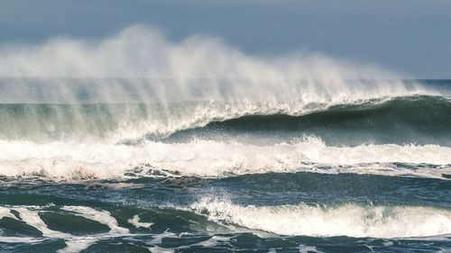 Waves splashing on rocks