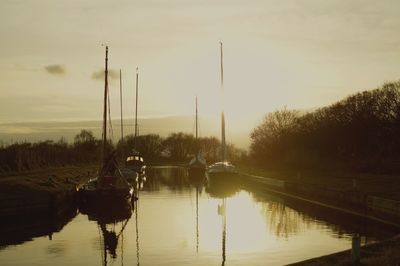 Reflection of sky in water at sunset