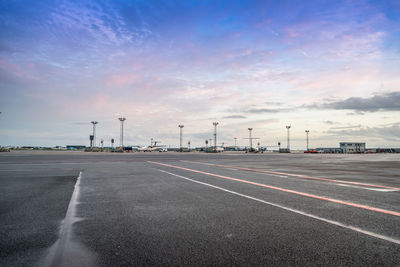 Airport runway against sky