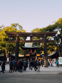 Tourist at the entrance of japanese temple