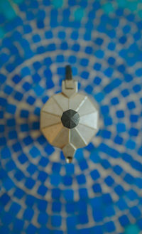 Close-up of electric lamp on floor