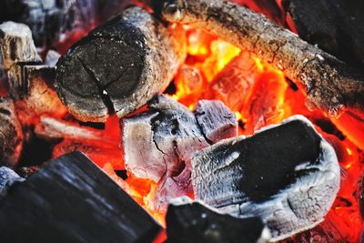 Close-up of firewood on barbecue grill