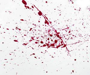 Close-up of water splashing against white background