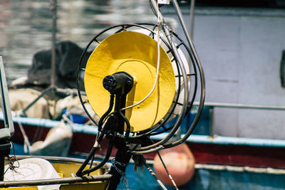 Close-up of yellow bicycle wheel