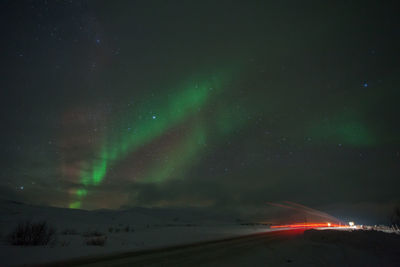 Scenic view of aurora borealis at ullsfjorden