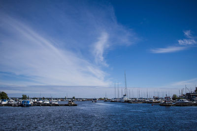 Boats moored at harbor