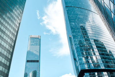 Low angle view of modern buildings against sky