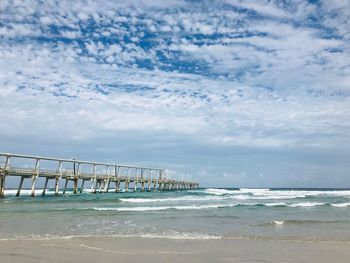 Scenic view of beach against sky