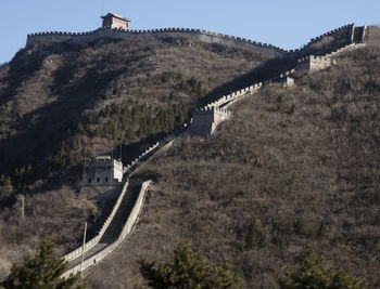 High angle view of road by mountain against clear sky