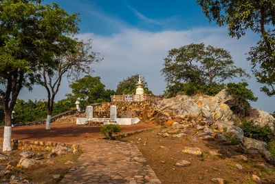 Buddhist stupa isolated with amazing blue sky from unique perspective