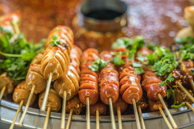 Close-up of meat on barbecue grill