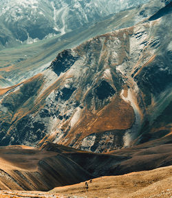 Aerial view of landscape with mountain range in the background