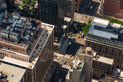 Top view of the streets of manhattan, with taxis.